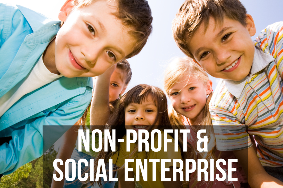 Headline 'nonprofit' over a group of smiling kids looks at the camera